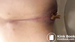 Thai girl pooping on toilet - video 3