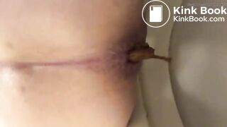 Thai girl pooping on toilet - video 3