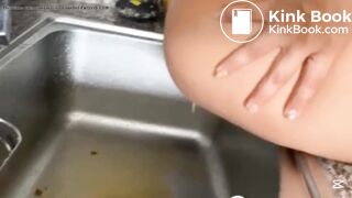 Hot girl shitting in the sink