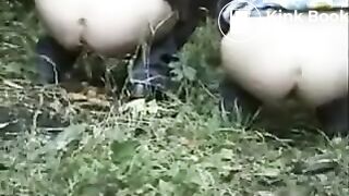 2 kinky girls pee and poo in the woods..