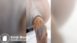 Black Ebony brown train leaving the tunnel!