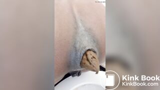 Black Ebony brown train leaving the tunnel!