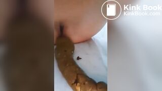 Beautiful French girl shits huge turd