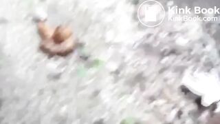 A Japanese woman poops in a back alley.