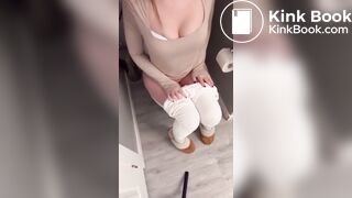 Sexy girl in white leggings having diarrhea on toilet