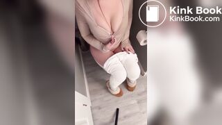 Sexy girl in white leggings having diarrhea on toilet