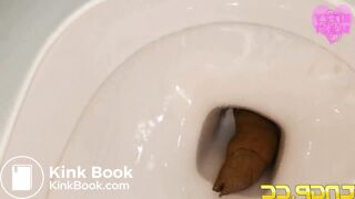 Girl does a massive log that clogs the toilet