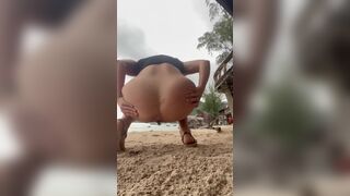Hot blonde pooping on the beach - video 2