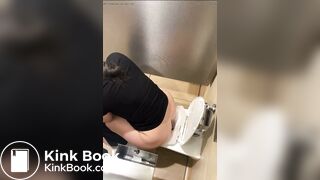 A girl was spied on while shitting in a shopping mall b