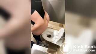 A girl was spied on while shitting in a shopping mall b