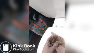 Girl shits a messy pile on the toilet lid