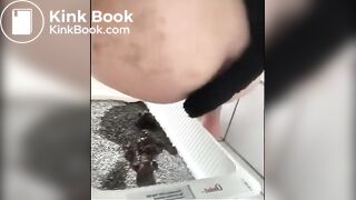 Cute girl shits in litter box