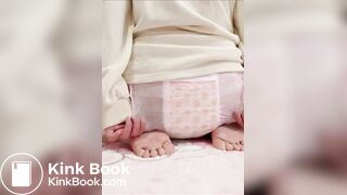 Chinese girl messes and sits in diaper