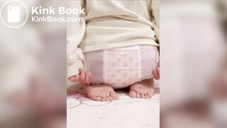 Chinese girl messes and sits in diaper
