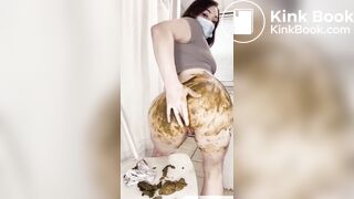 Mask-wearing girl shits herself