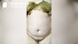 SSBBW smears her green shit on her big belly and tits