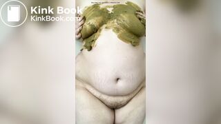 SSBBW smears her green shit on her big belly and tits