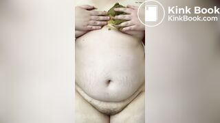 SSBBW smears her green shit on her big belly and tits