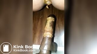 She fucks herself with a dildo and shits