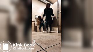 Blonde girl pooping while accompanied by friend