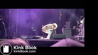 singer pisses on fan on stage.