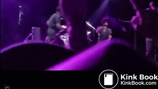 singer pisses on fan on stage.