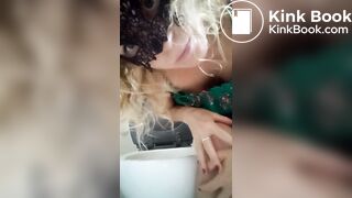 Blonde woman in dress defecates