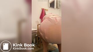 Diaper girl pushes out a big mess and pisses