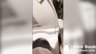 Japanese girl in pjs shitting on the toilet