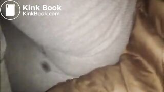 Woman fills pajamas in bed.