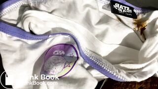 White panties overflowing with poop