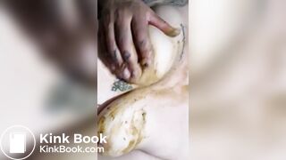 Girl smears shit on body and face