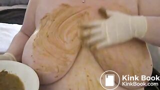 Smearing poo on huge tits..