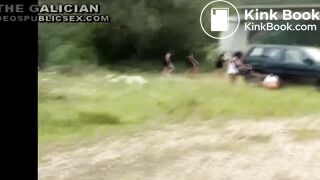 Two girls caught pooping behind car at festival