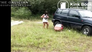 Two girls caught pooping behind car at festival
