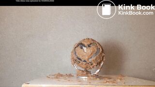 Girl shits on a globe
