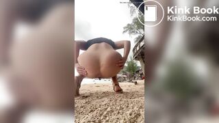 Hot blonde pooping on the beach