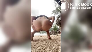 Hot blonde pooping on the beach