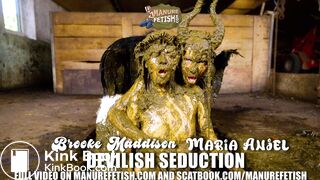 Devilish Seduction - lesbian masturbating in cowshit