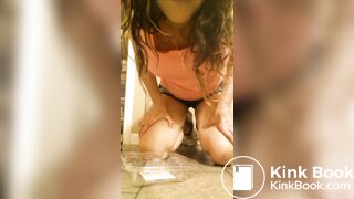 Milf shitting in plastic container