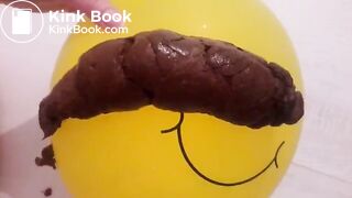 Girl shitting on balloon