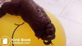 Girl shitting on balloon