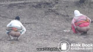 Two Indian aunty shitting