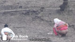 Two Indian aunty shitting