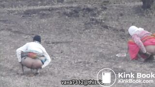 Two Indian aunty shitting