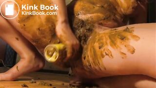 Scat slut shoves freshner in her cunt