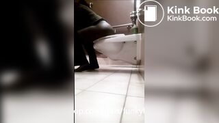 Ebony girl pooping and farting on public toilet - video 2