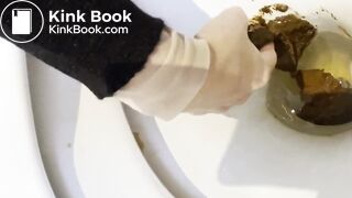 Tasting her shit in a public toilet