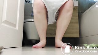 British girl poops in her diaper under her swimsuit