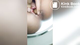 nice girl playing with her poop